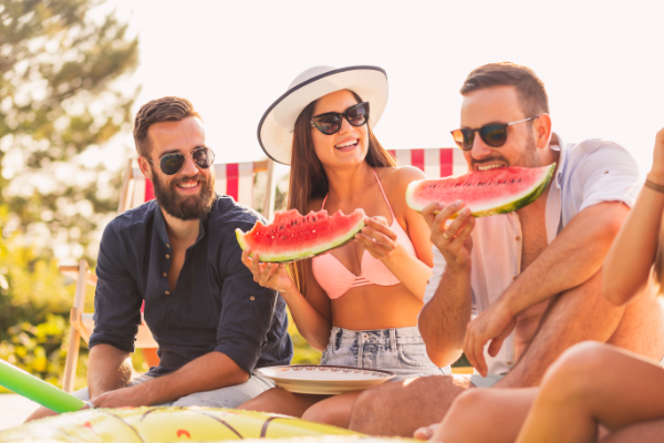 People Eating Watermelon At Festival 600X400