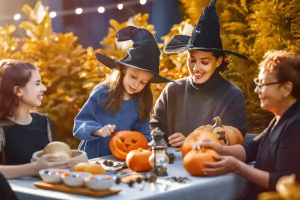 Halloween Pumpkin Carving Dressed As Witches 600X400